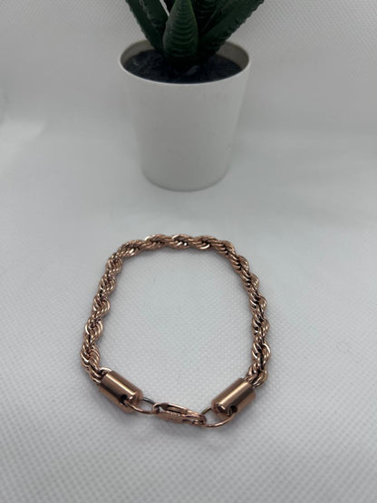 Combo Cadena + Pulsera LAZO ROSA en Oro Laminado 18k